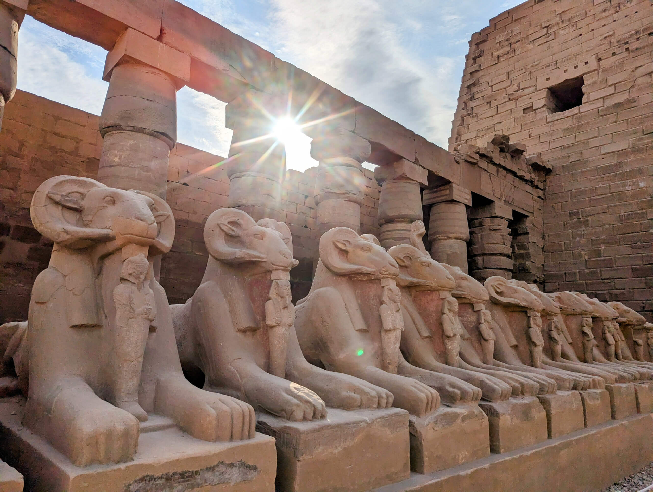 sphinx-row-karnak-temple-sunset-luxor-egypt